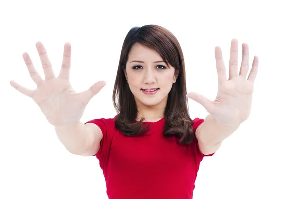 Roztomilá mladá žena ukazuje rukou — Stock fotografie