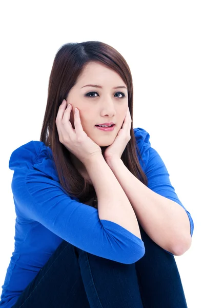 Attractive young woman with hands on face — Stock Photo, Image