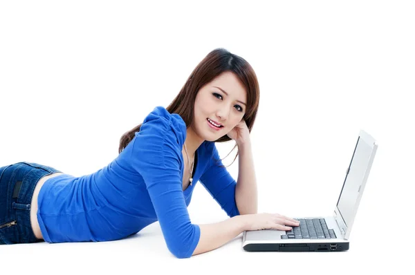 Cute young woman using laptop — Stock Photo, Image