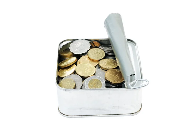 Monedas en lata de lata — Foto de Stock