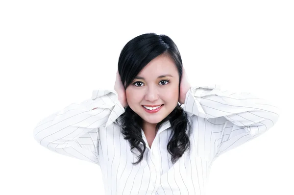 Attractive businesswoman covering ears with her hands — Stock Photo, Image