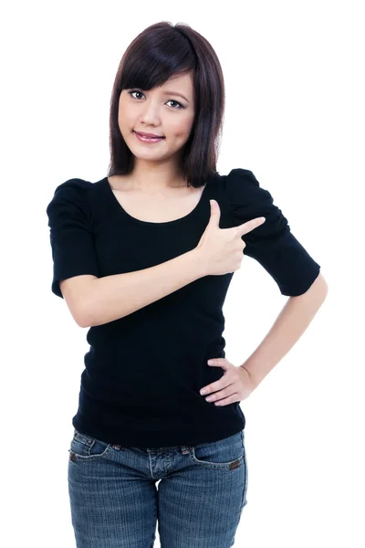 Attractive young woman pointing at copy space — Stock Photo, Image