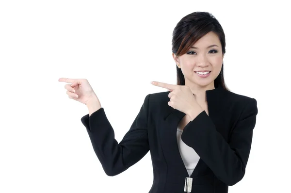 Attractive young businesswoman pointing — Stock Photo, Image