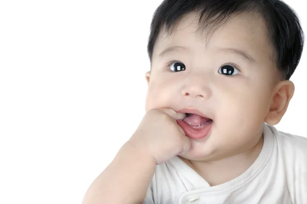 Bebê bebê bonito chupando seu dedo Fotos De Bancos De Imagens