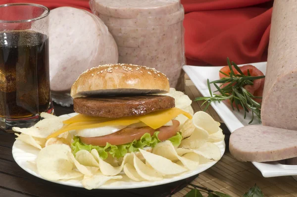 Stock image Cheeseburger with fries and beer