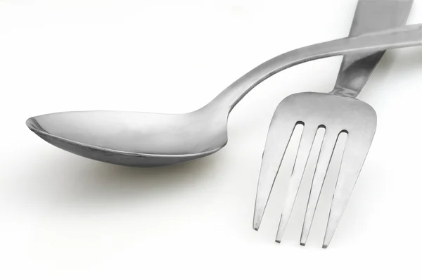 白色背景的勺子和叉子 — 图库照片