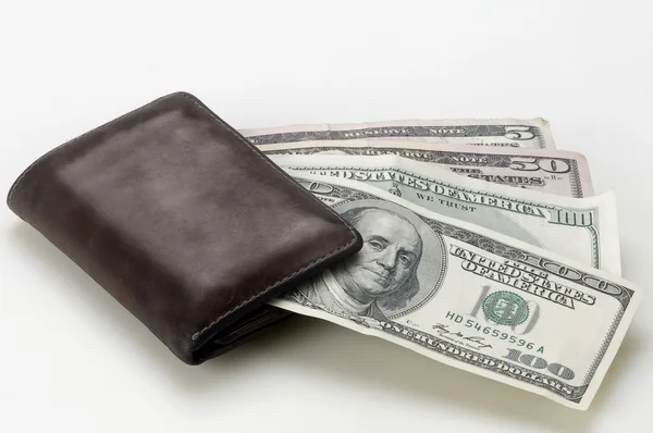 Wallet with dollars on white background — Stock Photo, Image
