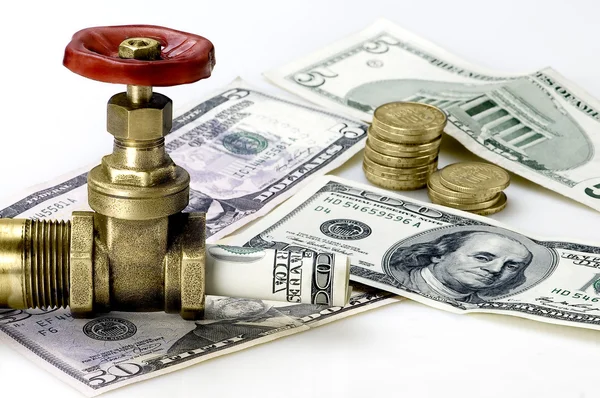 With dollars and coins tap — Stock Photo, Image