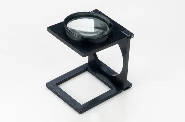 Stock image Magnifying glass on white background