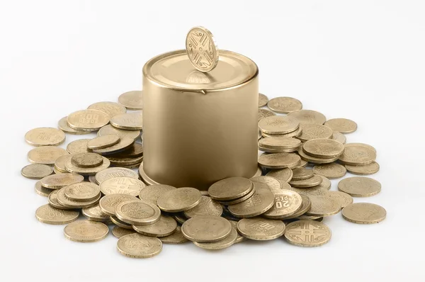 Besparingen in gouden munten alcancia — Stockfoto