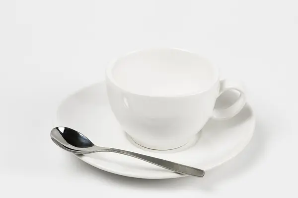 Lege koffie cups met witte kom en lepel — Stockfoto