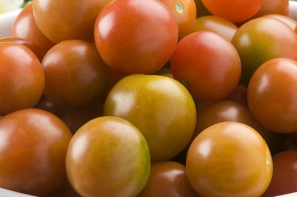 Tomates cerises Photos De Stock Libres De Droits
