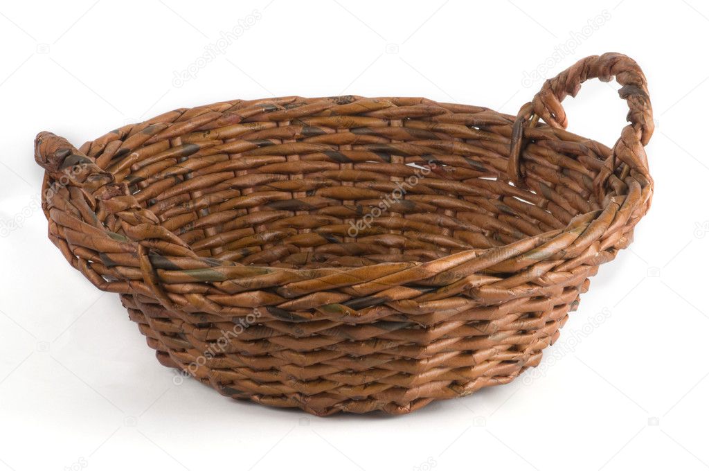 Empty brown wicker basket isolated on the white background