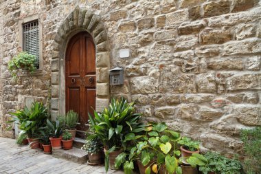 Idyllic entrance to the tuscan house clipart