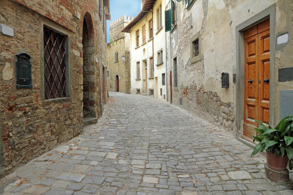 Narrow italian street in tuscan borgo Montefioralle, Italy, Europe