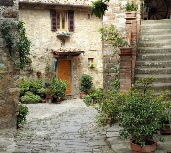 Beautiful courtyard in tuscan medieval village Montefioralle near Greve in Chianti , Italy, Europe
