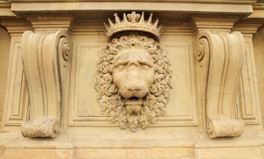 Ornamnet with lion on facade clipart