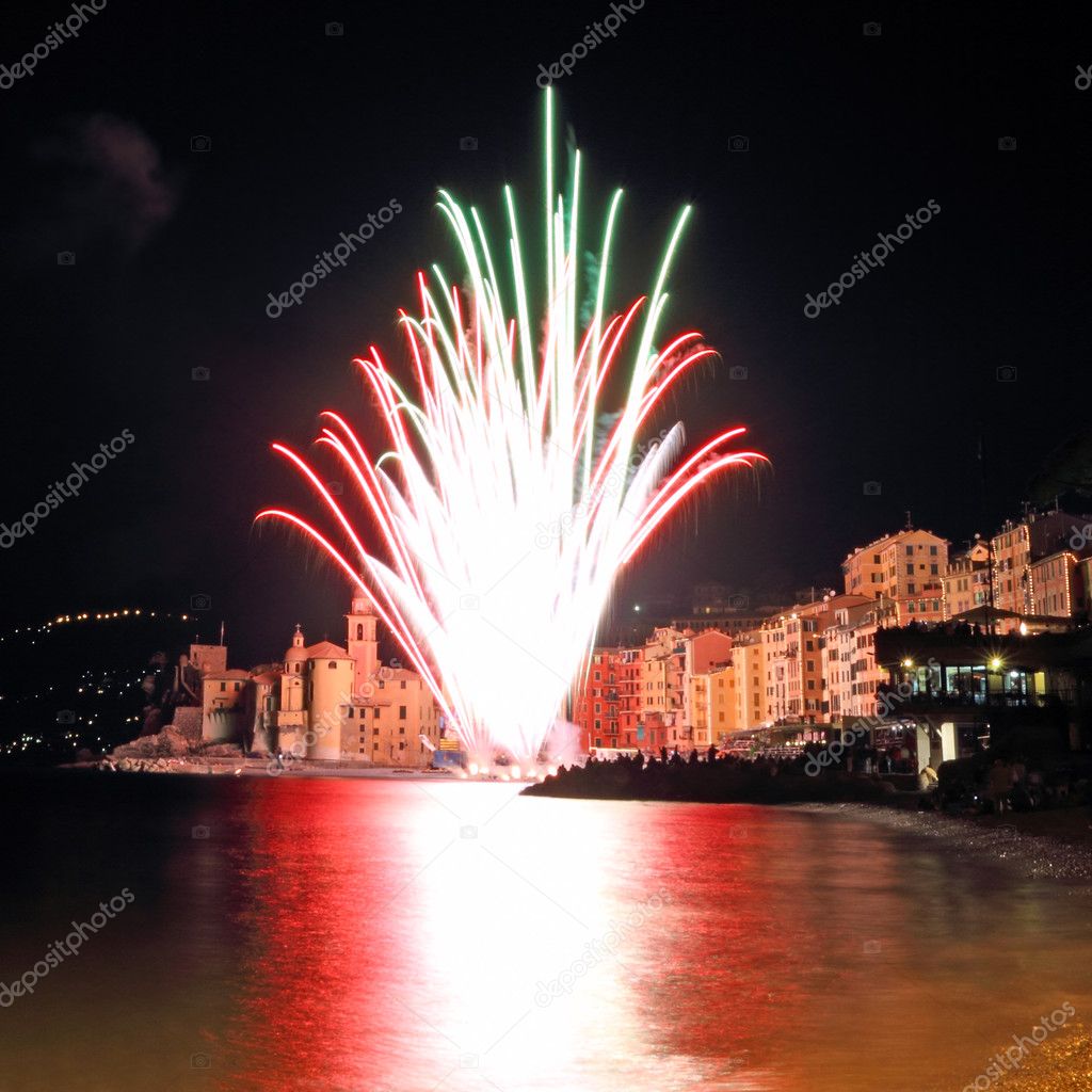 Fireworks on the beach of italian village