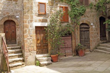 Italian yard in tuscan village clipart