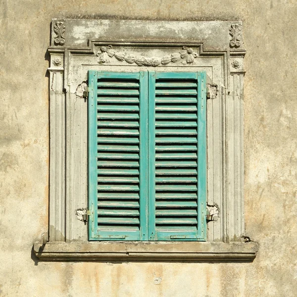 stock image Beautiful old window with green shutters