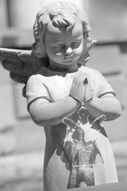 Cemetery angel holding glass angel toy clipart