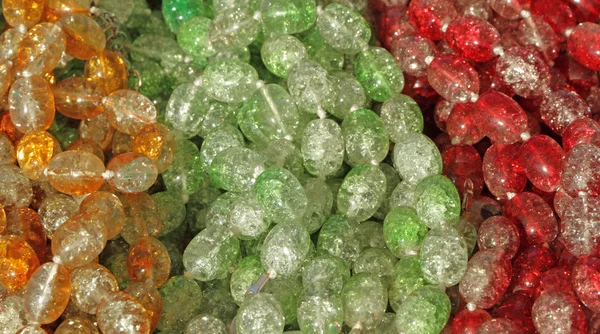 Fondo de perlas de vidrio verde, rojo y naranja —  Fotos de Stock