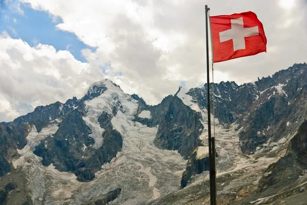 Swiss flag with view of Dolent glacier in Swiss Alps — Stock Photo, Image