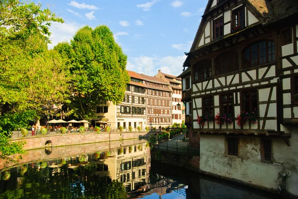 stock image Half-timbered houses by the canal in old town of Strasbourg, France