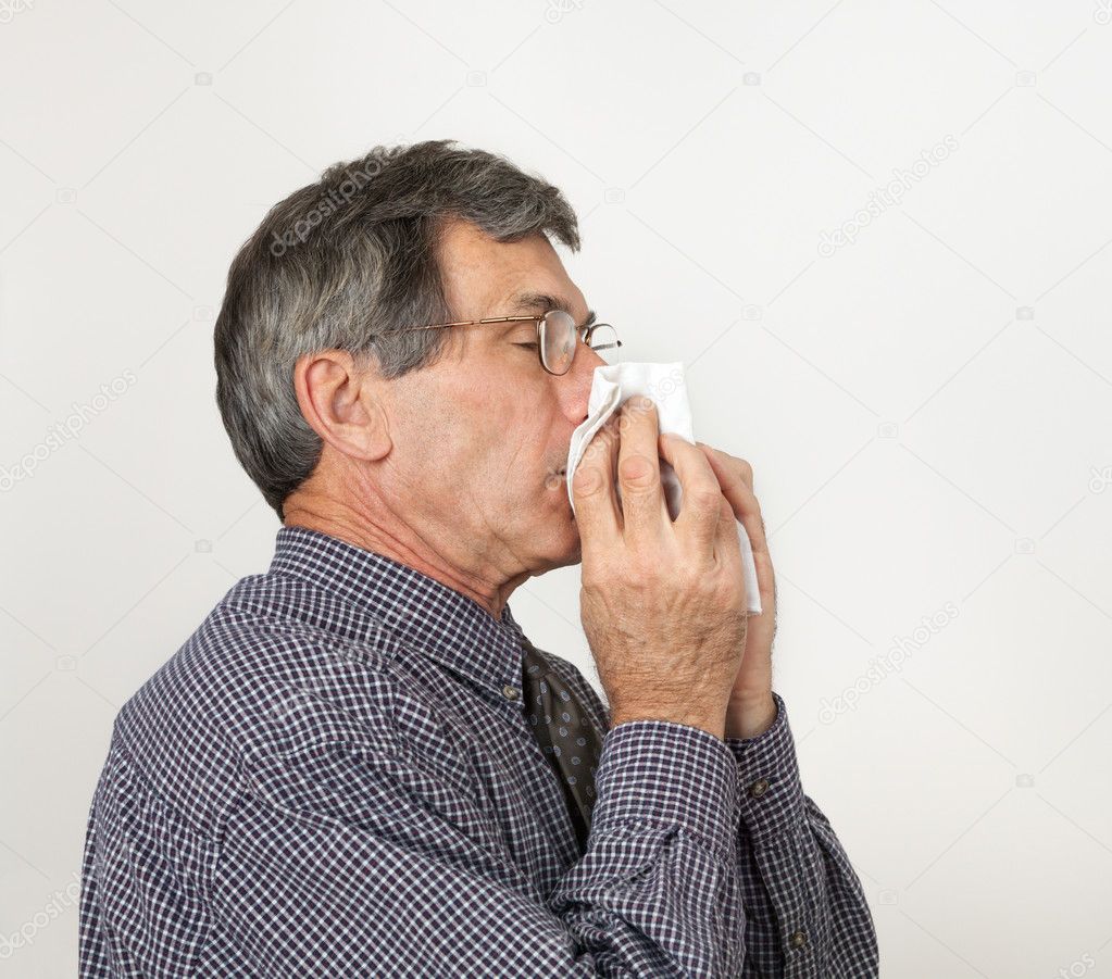 Man With Cold Sneezing