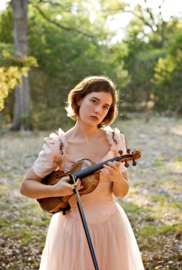 Violin Girl Portrait in Nature clipart