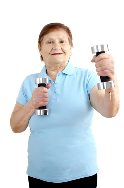 Starsza kobieta robi treningu — Zdjęcie stockowe