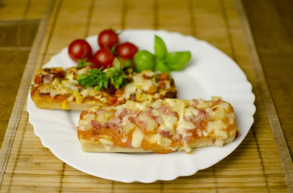 Baguette-Pizza Stockfoto