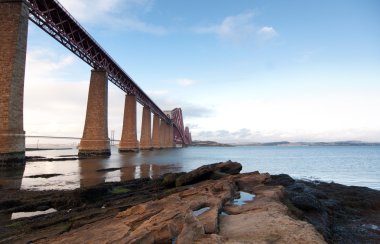 Forth Rail Bridge landscape with foreground rocks clipart