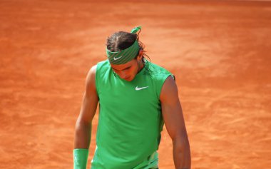 Rafael Nadal during a match at Roland Garros in 2008 clipart