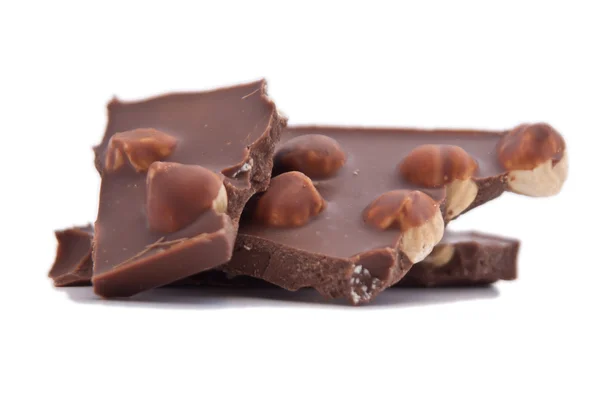 Quadrados de chocolate escuro com nozes — Fotografia de Stock