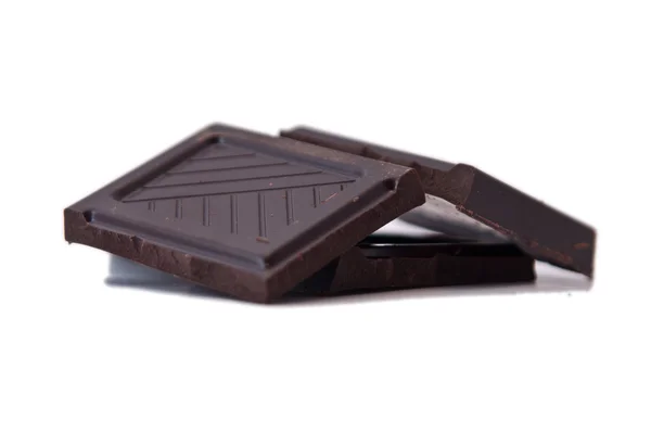 Squares of dark chocolate — Stok fotoğraf