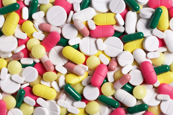 Comprimidos e comprimidos — Fotografia de Stock