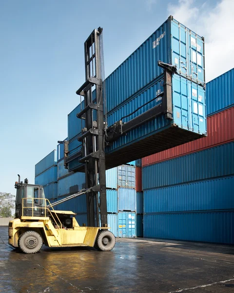 stock image Forklift lifting container