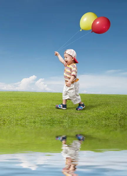 Kid and balloon — Stock Photo, Image
