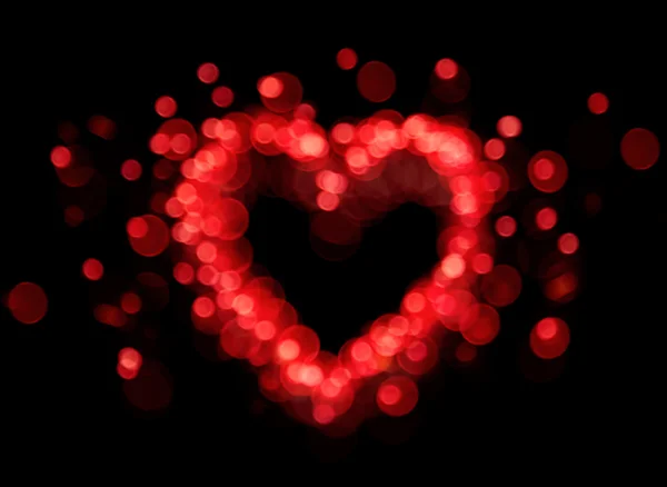 Červená bokeh tvar srdce — Stock fotografie