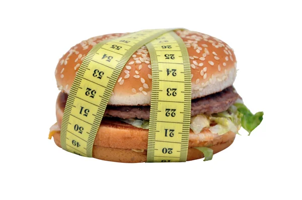Hamburguesa con queso y cinta métrica — Foto de Stock