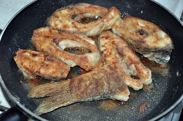 stock image Fried fish in a frying pan