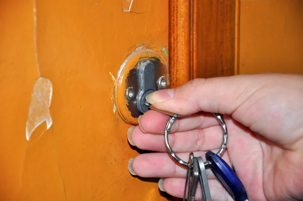 stock image Opening the doors of the old castle key