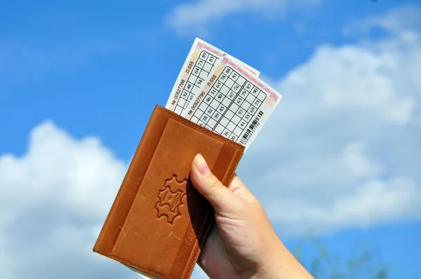 Bilhetes de loteria no passaporte — Fotografia de Stock
