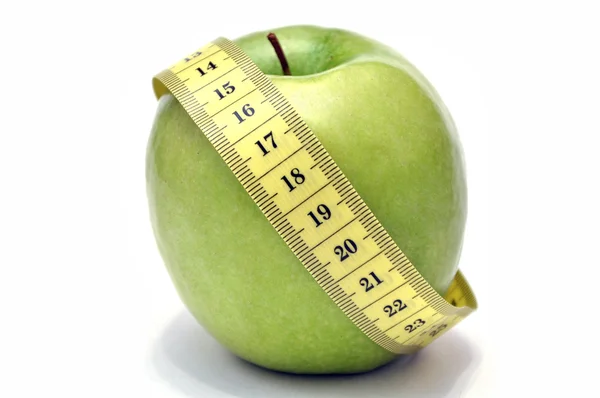 Groene appel en meetlint — Stockfoto