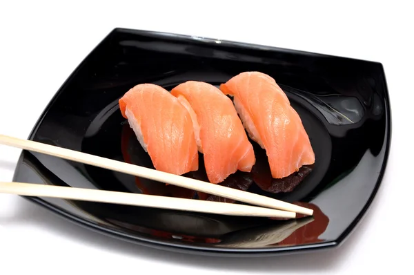 Японская сушка на тарелке — стоковое фото