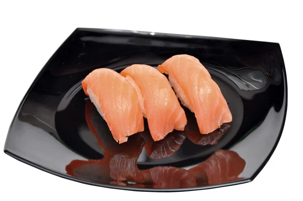 Японская сушка на тарелке — стоковое фото