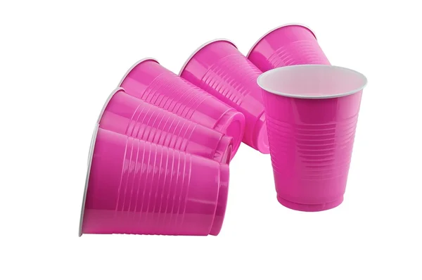 Tasses en plastique rose . Photo De Stock
