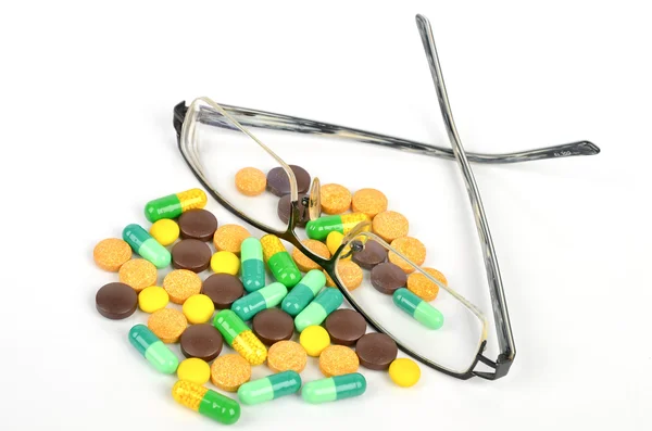 Medicijnen en bril — Stockfoto