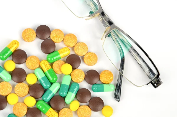 Medicine and glasses — Stock Photo, Image